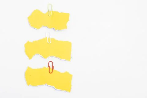 Yellow torn paper For adding text. On white background, copy space. Stock Photos