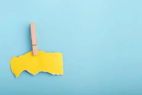 Yellow torn paper For adding text. On white background, copy space. Stock Photos