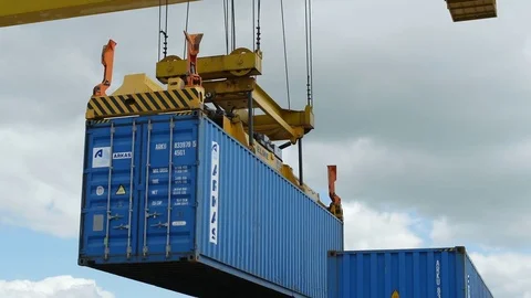 Yellow Tower Crane Loads Container on Big Lorry 스톡 동영상 73867365
