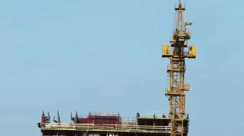 Yellow tower crane time lapse Stock Footage 61462298