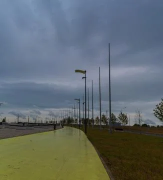 Yellow track at the stadium for cyclists Stock Photos