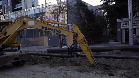Yellow Tractor Digging A Hole Stock Footage 126719323