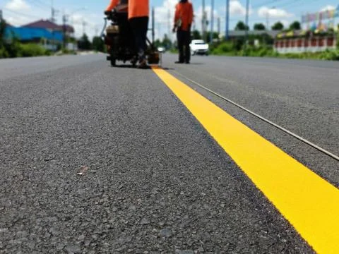 Yellow traffic line in Thailand Stock Photos