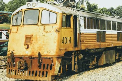Yellow train, Thailand train. Procession yellow Train led by diesel electri.. Stock Photos