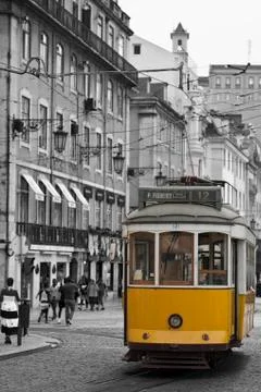 Yellow tram in lisbon. Stock Photos