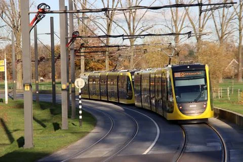 Yellow trams of U-NET riding on the Uithoflijn Stock Photos