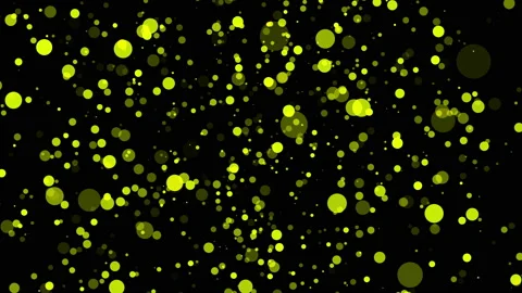 Yellow translucent particles slowly moving on a dark background. abstract animat Stock Footage 97167272