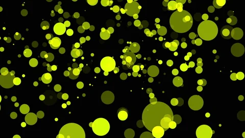 Yellow translucent particles slowly moving on a dark background. abstract animat Stock Footage 97167381
