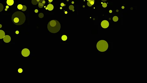 Yellow translucent particles slowly moving on a dark background. abstract animat Stock Footage 97167428