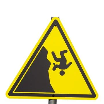 Yellow triangular sign with a man falling from a cliff on a white background Stock Photos