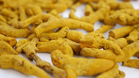 Yellow turmeric placed over a table Stock Footage 147695575