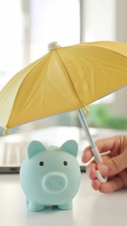 Yellow Umbrella Shielding Laptop for Cybersecurity and Data Protection Concept Stock Footage 343531452