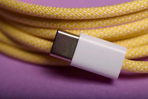 Yellow USB Type C connection cable for fast data transfer. 스톡 사진