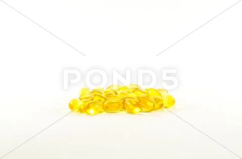 Yellow vitamins Stock Photos