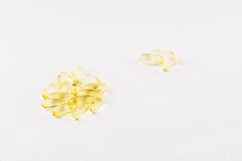 Yellow vitamins Stock Photos