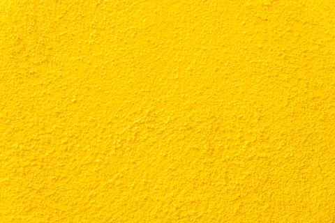 Yellow wall background and texture Stock Photos