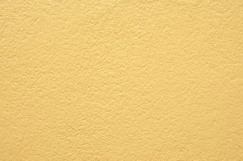 Yellow wall for background texture Stock Photos