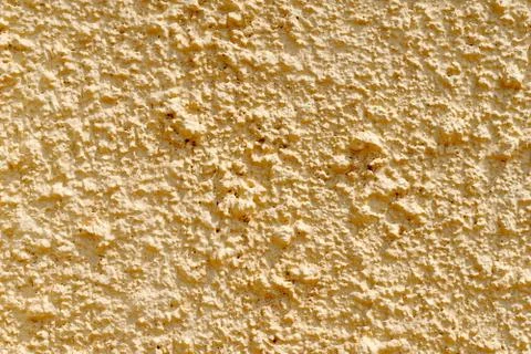 Yellow wall background texture Stock Photos