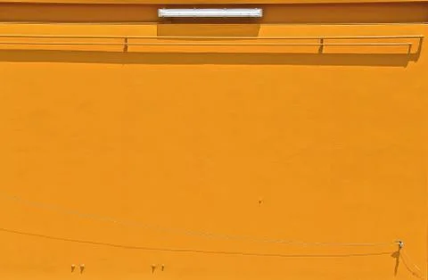Yellow wall with shadows Stock Photos