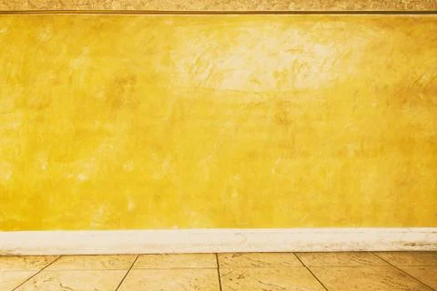 Yellow wall texture, abstract background. Stock Photos
