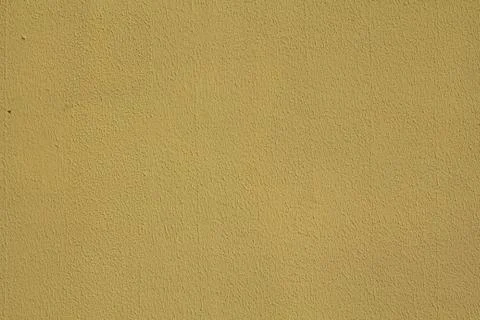 Yellow wall texture Stock Photos