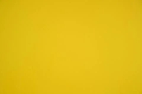 Yellow wall textured background, interior design Stock Photos