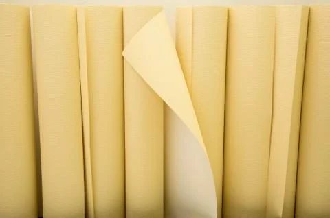 Yellow wallpapers in a row Stock-Fotos