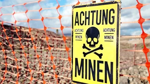Yellow  warning sign marking a dangerous area with explosives Stock-Footage 332164140