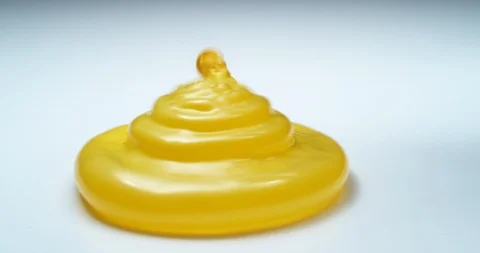 Yellow water balloon bouncing in super slow motion.  Shot on Phantom Flex 4K. Stock Footage 125344791