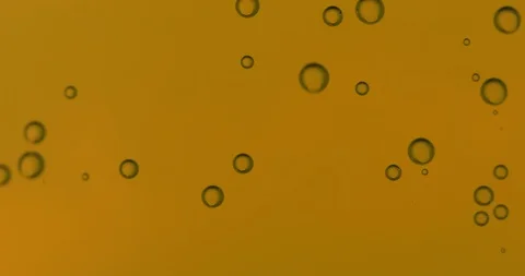Yellow Water bubbles background, microscope look Stock Footage 105423911