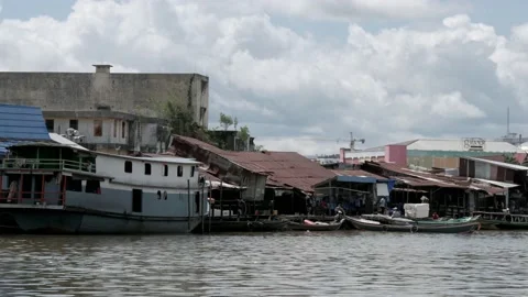 Yellow water bus passing through the traditional dock Stock Footage 132602010