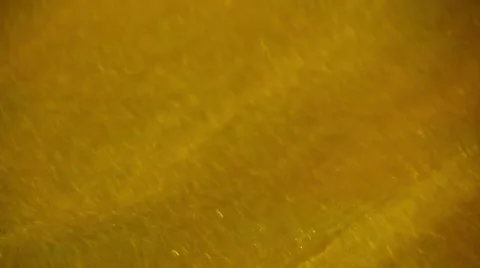 Yellow water close-up background Stock Footage 66426771