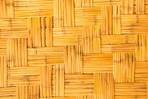 Yellow  weaved traiditional bamboo wicker background Stock Photos