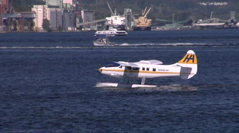 Yellow White Float Plane Takes Off 스톡 동영상 826943