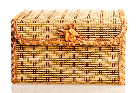 Yellow wicker box for needlework on a white background. Stock Photos