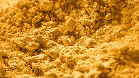 Yellow wind disturbing powder surface for chamomile concept Stock Footage 343047747
