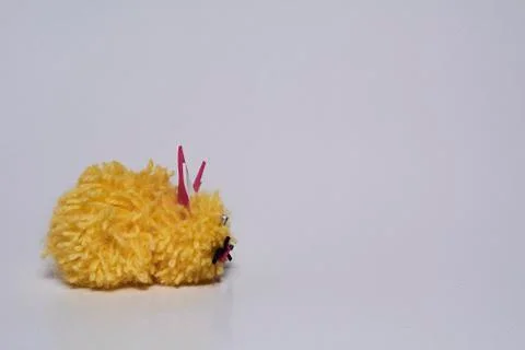 Yellow wool bunny with white background Stock Photos