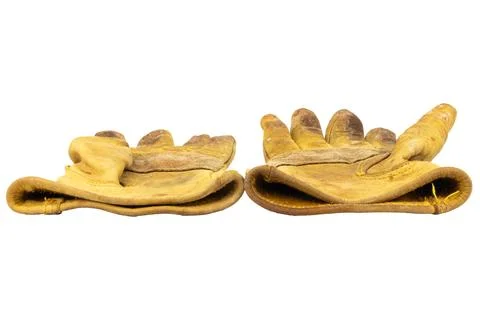 Yellow work gloves Dirty Old isolated on white background Stock Photos
