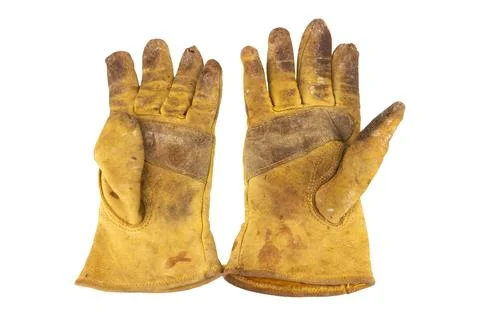 Yellow work gloves Dirty Old isolated on white background Stock Photos