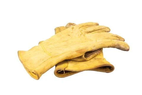 Yellow work gloves Dirty Old isolated on white background Stock Photos