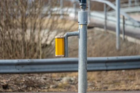 Yellow zebra crossing button box on a pole. Stock Photos