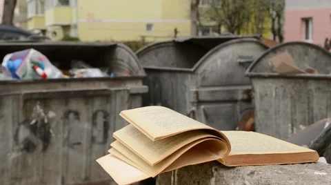 Yellowed Book and Dumpster Stock Footage 46129206