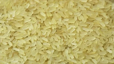 Yellowish steamed rice spins as a backdrop in a Chinese restaurant Stock Footage 160945657