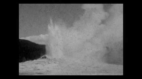 Yellowstone NP Old Faithful and spectators 1934 B-W Stock Footage