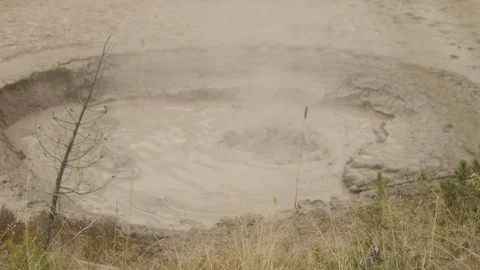 Yellowstone Pool of Hot Bubbling Boiling Mud Pot Stock Footage 122224336