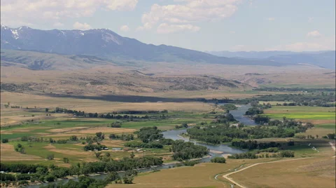 Yellowstone River With Mountains On Either Side Stock Footage 65437971