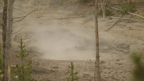 Yellowstone Very Active Pool of Hot Bubbling Boiling Mud Pot Stock Footage 122224312