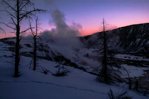 Yellowstone winter landscape at sunset Stock Photos