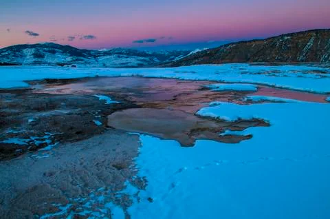 Yellowstone winter landscape at sunset Stock Photos