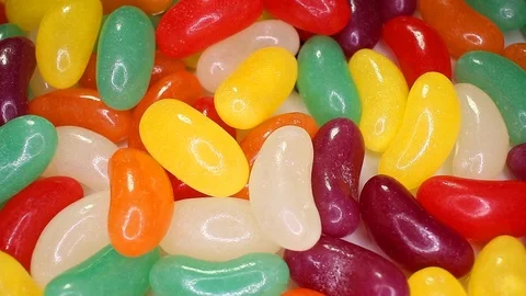 Yelly bean beans closeup texture rotating video background Stock Footage 113143132